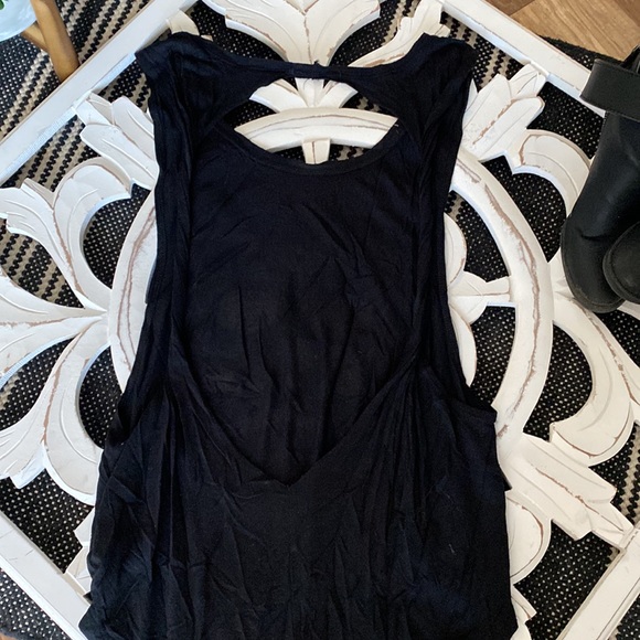 Black tank top with open back and skull design. Size medium. - Picture 5 of 5